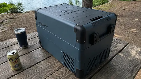 Dometic CFX2 37L portable refrigerator and freezer on a picnic table